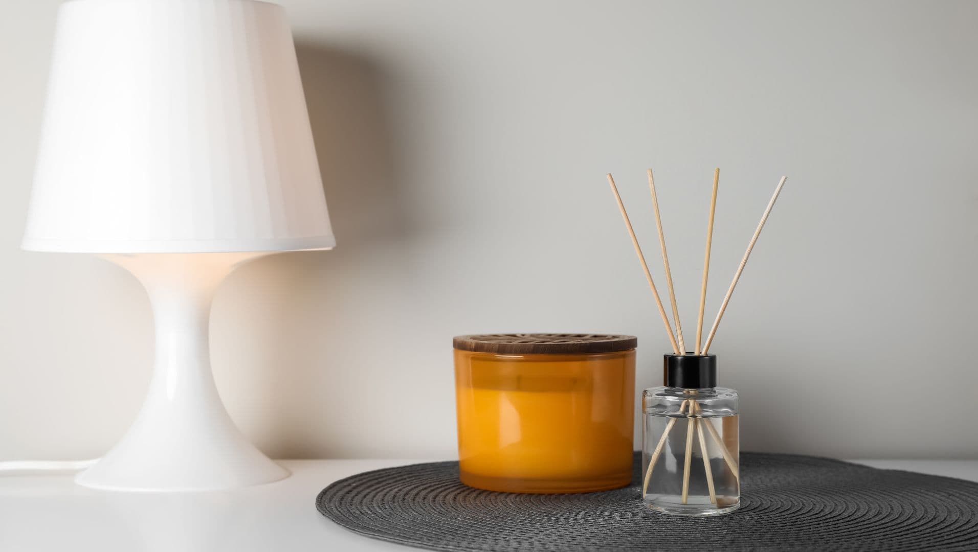 Close-up of rattan reeds in a glass diffuser